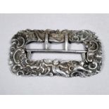 A silver nurse's buckle - London 1921, Crate & Mansell, height 7.5cm, weight 51.9g.