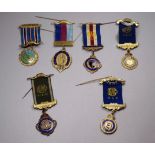 A silver gilt Masonic jewel - weight 25g, together with five further Masonic jewels.