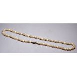 A string of uniform pearls - with 9ct yellow gold filigree clasp, length 48cm.