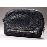 Alexander Wang - a black textured leather zipped purse, width 16.5cm.