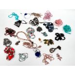 Approximately twenty-five costume jewellery necklaces.