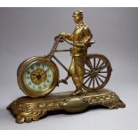 A novelty brass desk timepiece by The British United Clock Company - in the form of a gentleman