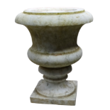 A 19th/20th century white marble urn - raised on a narrow square base, height 31cm.