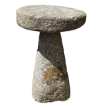 An old Cornish weathered granite garden staddle stone - of typical form with domed circular top