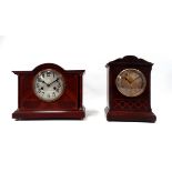 An Edwardian mahogany and walnut mantel clock - the silver dial set out with Arabic numerals and