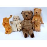 An early 20th century plush teddy bear - circa 1932, possibly Merrythought with glass eyes, stitched
