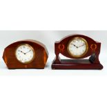 An Edwardian mahogany case mantel clock - the case with wreath inlay, the silvered dial set out in