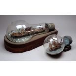 Ship in a light bulb, 20th century - the un-named motor vessel in a calm sea, length 25cm,