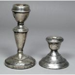 A silver filled candlestick - Birmingham 1937, John Rose, height 12cm, together with another
