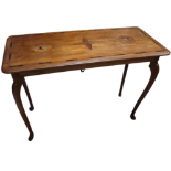 An early 20th century walnut and inlaid occasional table - the rectangular top decorated with a star