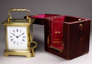 A 20th century carriage timepiece - with a squat corniche case fitted with a white enamel dial set