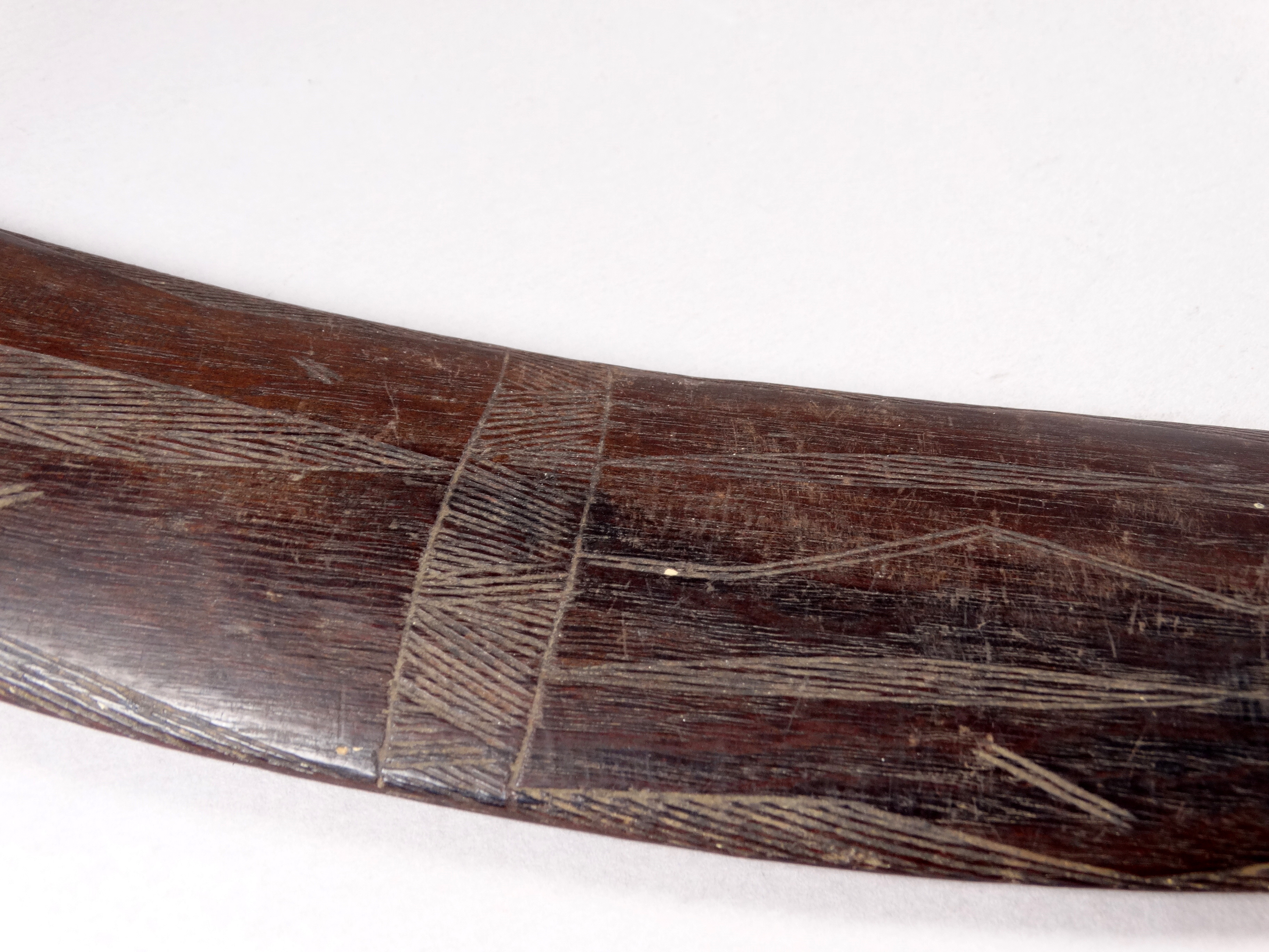 An early 20th century Australian hardwood boomerang - with linear incised panel decoration, length - Image 4 of 5