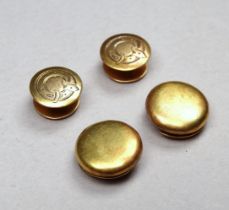 A pair of 15ct yellow gold shirt studs - engraved with buckle design, together with a pair of 18ct