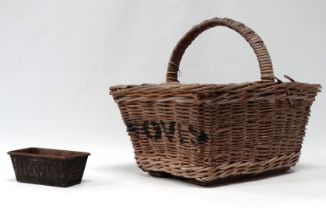 A mid 20th century Hovis wicker bread basket - of rectangular form with a hoop handle and bearing