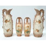 A pair of late 19th century blush ivory porcelain vases by Ernst Wahliss - with reticulated