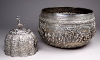 A late 19th/early 20th century Indian white metal bowl - repousse decorated with panels of figures