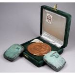 20th/21st century British - interlocking two part bronze, with Verdigris patination 4 x 6cm,