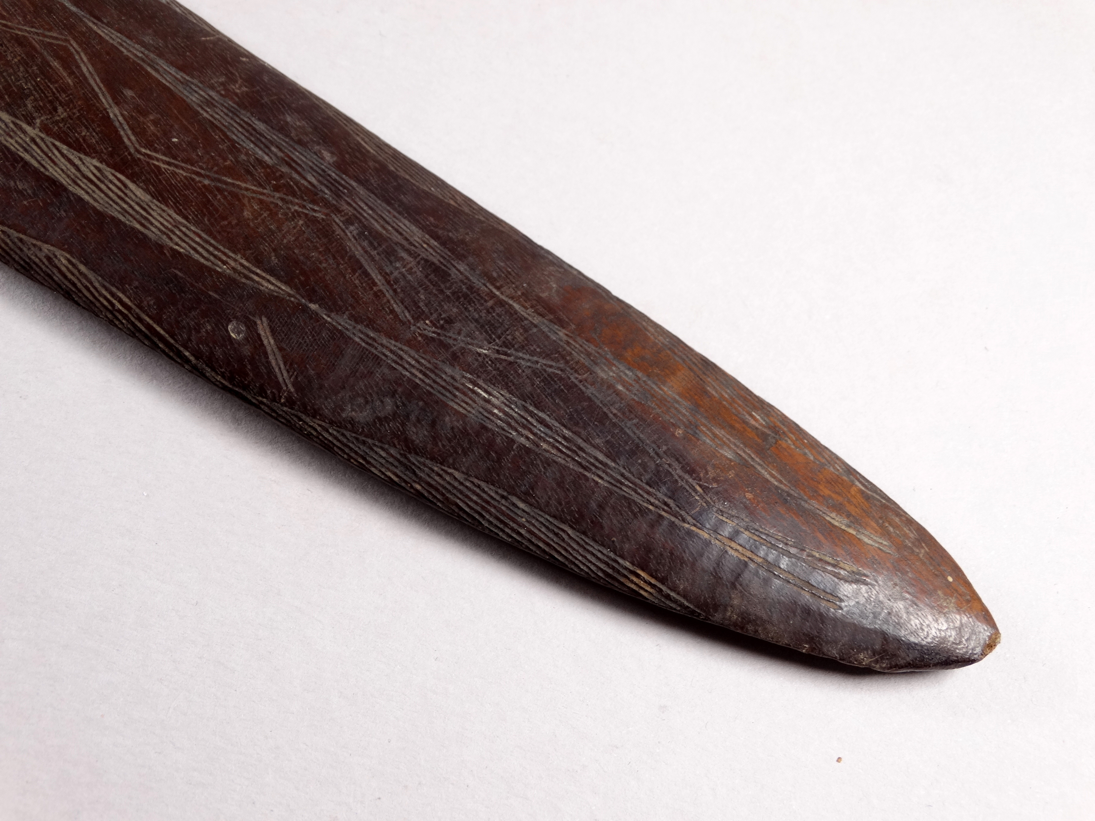 An early 20th century Australian hardwood boomerang - with linear incised panel decoration, length - Image 3 of 5