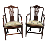 A pair of George III mahogany open arm chairs - with pierced vase shaped splats, slip-in seats and