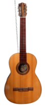 A vintage Spanish acoustic guitar - together with a hard case