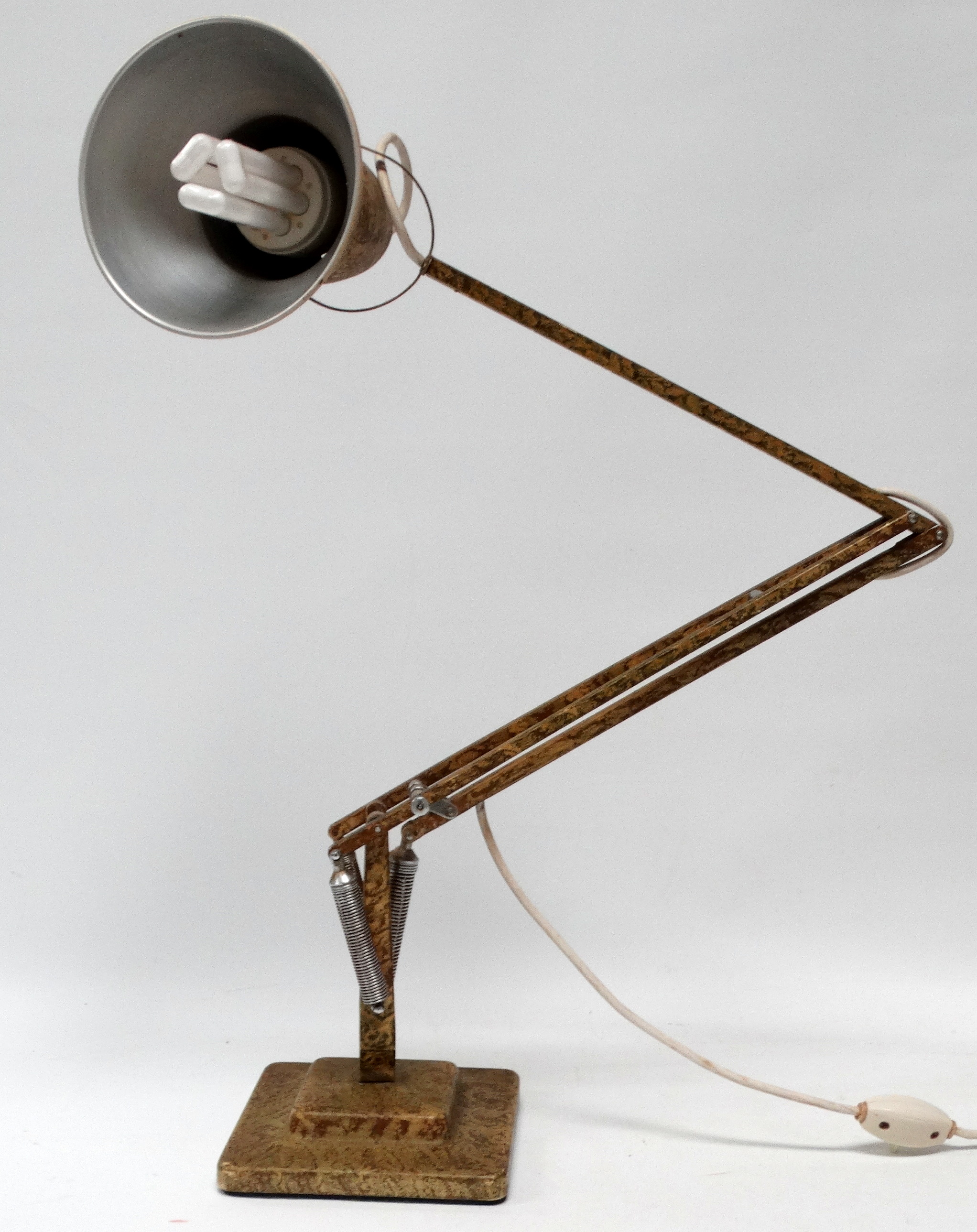 A Herbert Terry Anglepoise lamp - with a square stepped base and cream scumbled finish.