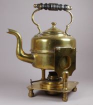 An Art Nouveau style brass spirit kettle and stand - with a turned ebonised handle, the square
