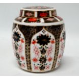 A Royal Crown Derby Imari ginger jar and cover - height 18cm.