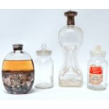 A shaped glass Haig & Haig Whisky decanter with silver plated collar and lid, height 27cm - together