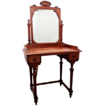 An Edwardian walnut dressing table - the shaped rectangular mirror between turned supports above a