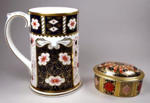 A Royal Crown Derby Millennium mug - of Imari pattern, height 14cm, together with an oval lidded box