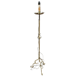 An early 20th century wrought steel standard lamp - gilt painted, height 151cm.