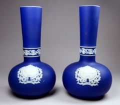 A pair of Adams Jasperware vases - bulbous with a narrow neck and decorated with the Penzance