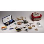 A small quantity of costume jewellery - including six pairs of yellow metal earrings, a pocket