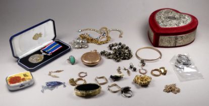 A small quantity of costume jewellery - including six pairs of yellow metal earrings, a pocket
