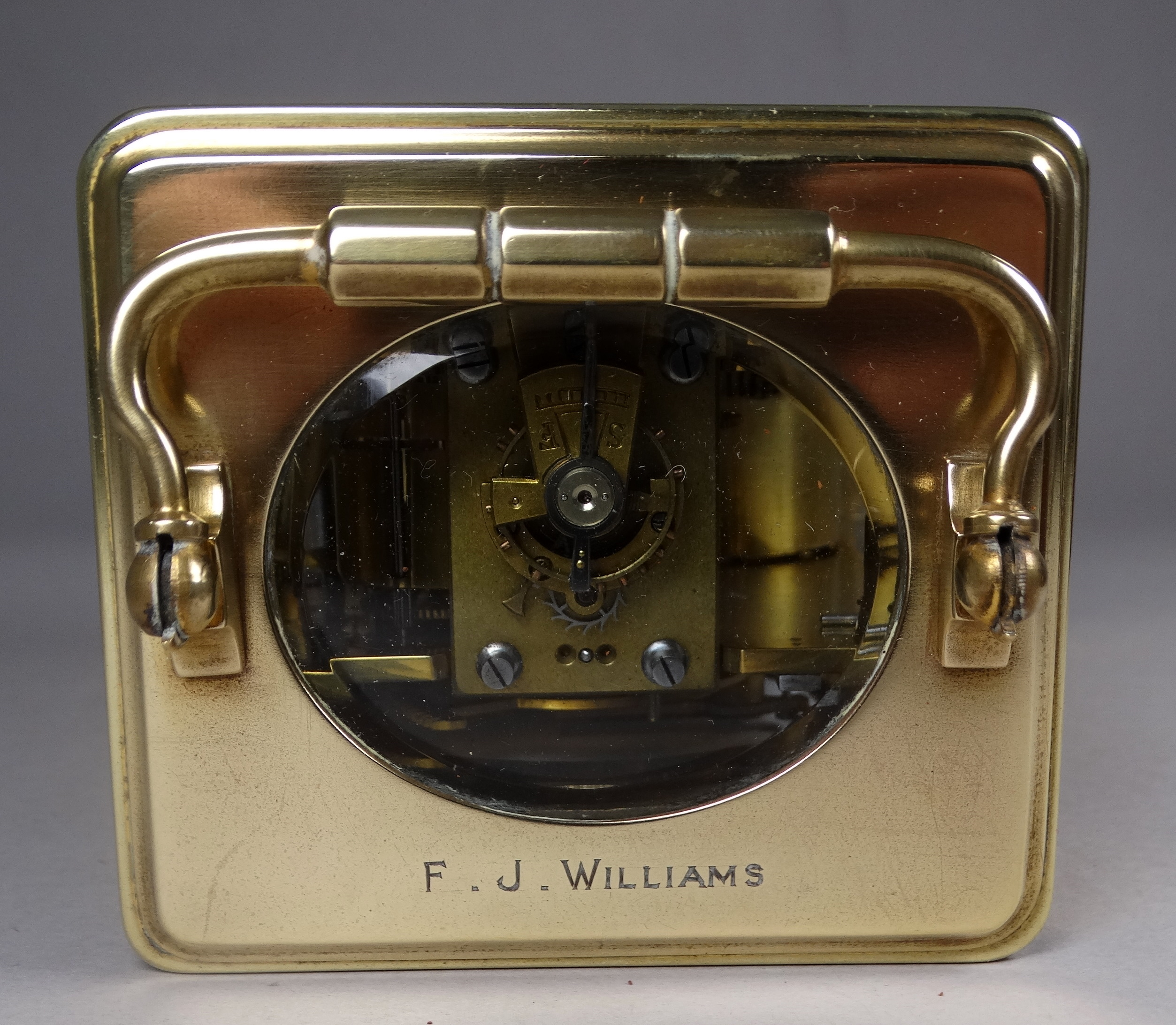 A 20th century carriage clock - the corniche case bearing presentation name and with a white - Image 7 of 9