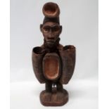 A Tribal Art West African Bakongo 'Cult' standing wooden fetish of male figure form - hung around