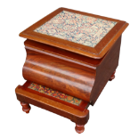 A Victorian mahogany step commode - the hinged lid opening to reveal a ceramic inset, raised on