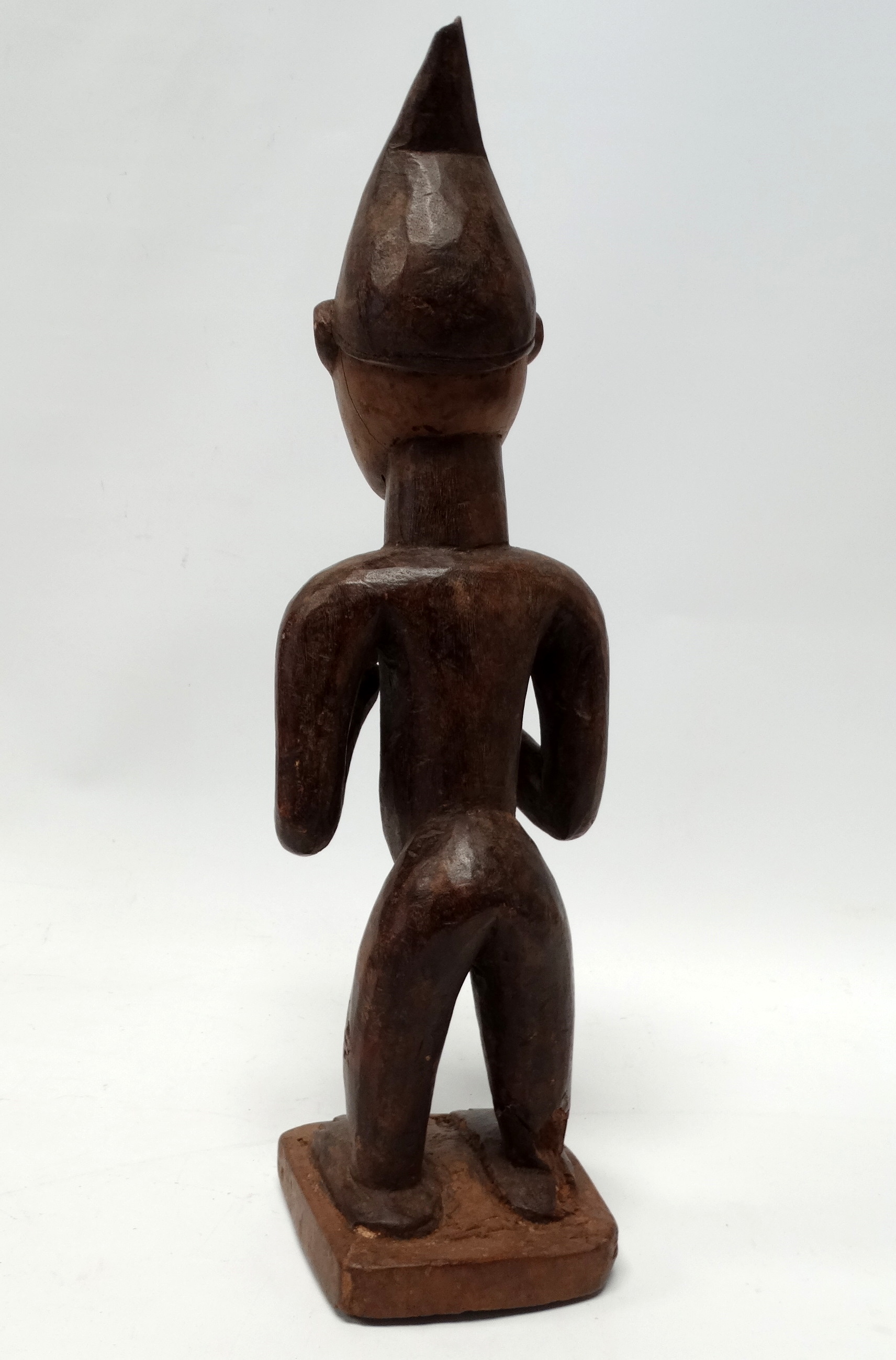 A Yoruba fertility figure - the standing female with bleached face and wearing a bifurcated hat, - Image 3 of 5