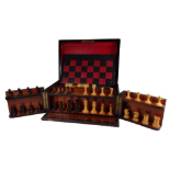 A Victorian coromandel games compendium - containing folding chess and backgammon board, ebonised