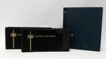 A quantity of UK First Day Covers - second half 20th century in two albums, approximately forty,