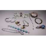 A quantity of white metal and costume jewellery - including a white metal mounted jade coloured