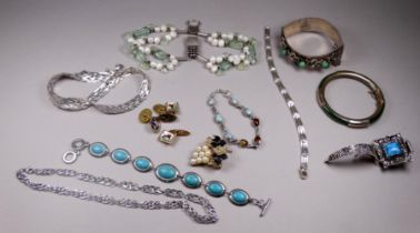 A quantity of white metal and costume jewellery - including a white metal mounted jade coloured
