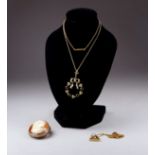 A Belle Epoch wreath pendant - set with seed pearls and peridot in gilt metal frame, weight 3.2g, on