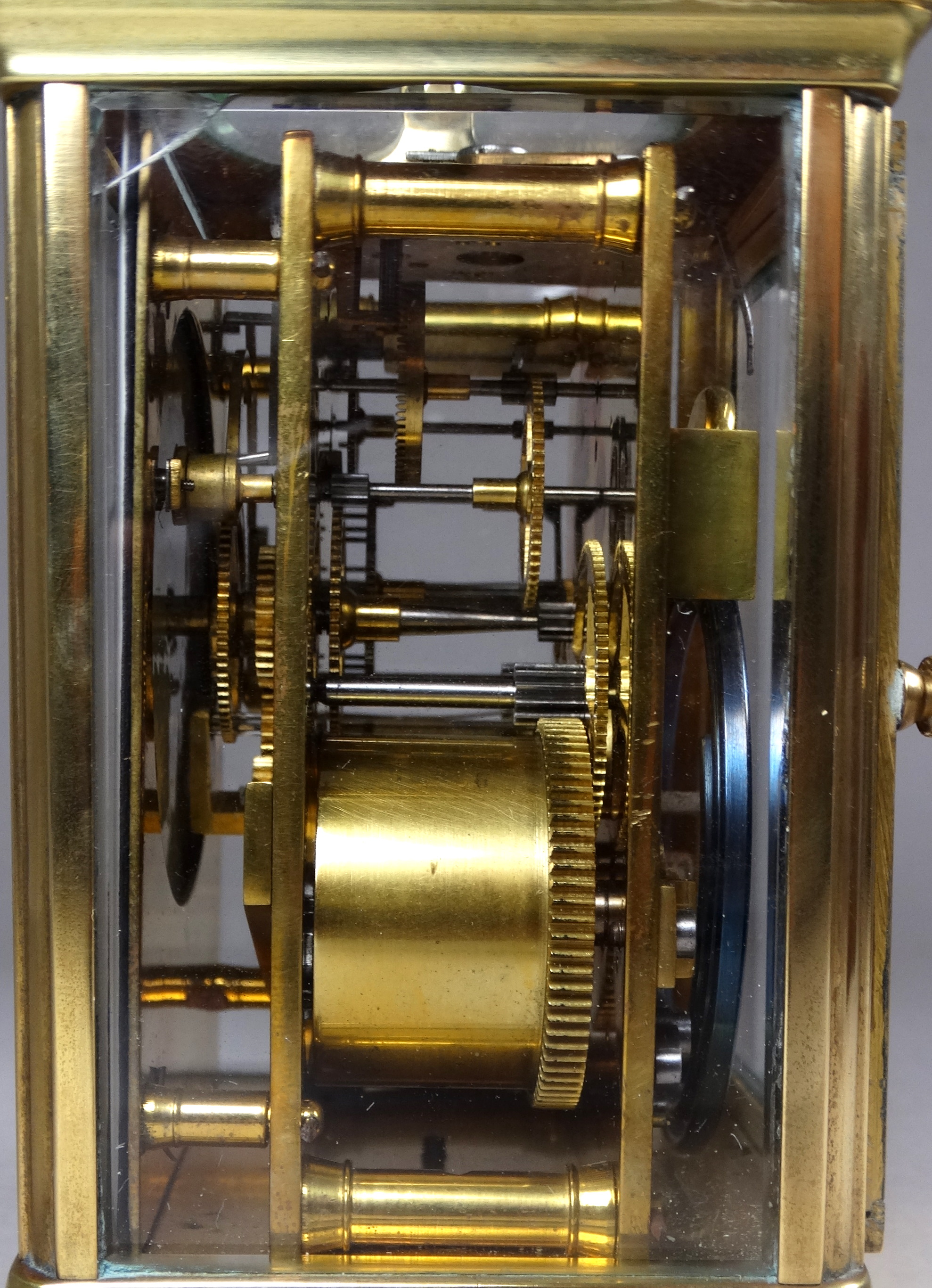 A 20th century carriage clock - the corniche case bearing presentation name and with a white - Image 6 of 9