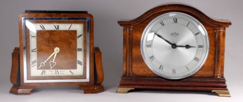 An Art Deco style walnut mantle timepiece by Elliott - with a square silvered dial set out in