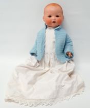 An early 20th century Armand Marseille bisque headed doll - stamped 'AM Germany 351./5.K.', with
