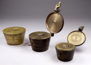 A set of Victorian brass cup weights - six graduated with the largest being 4 troy oz, together with