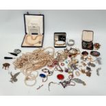 A quantity of costume jewellery, including some silver items.