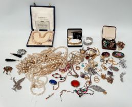 A quantity of costume jewellery, including some silver items.