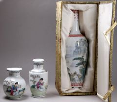 A 20th century Chinese narrow baluster shaped vase - decorated with a mountainous landscape scene,